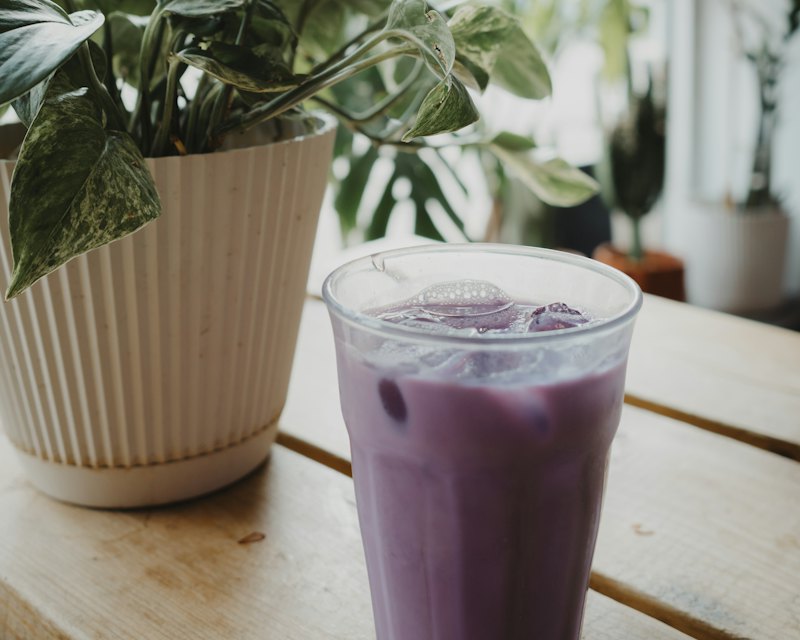 Lavender milk tea in a glass